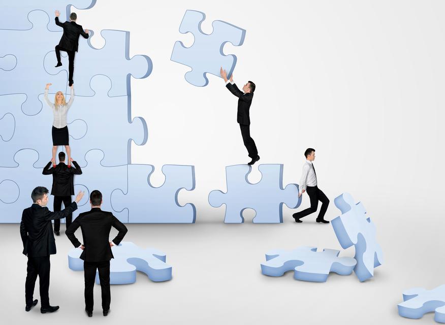 051550568 business team building puzzle
